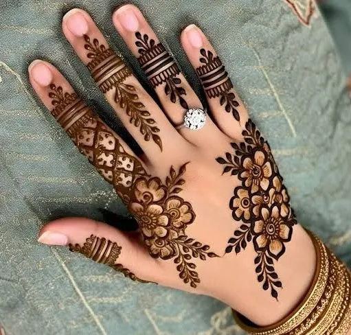 modern back hand mehndi design